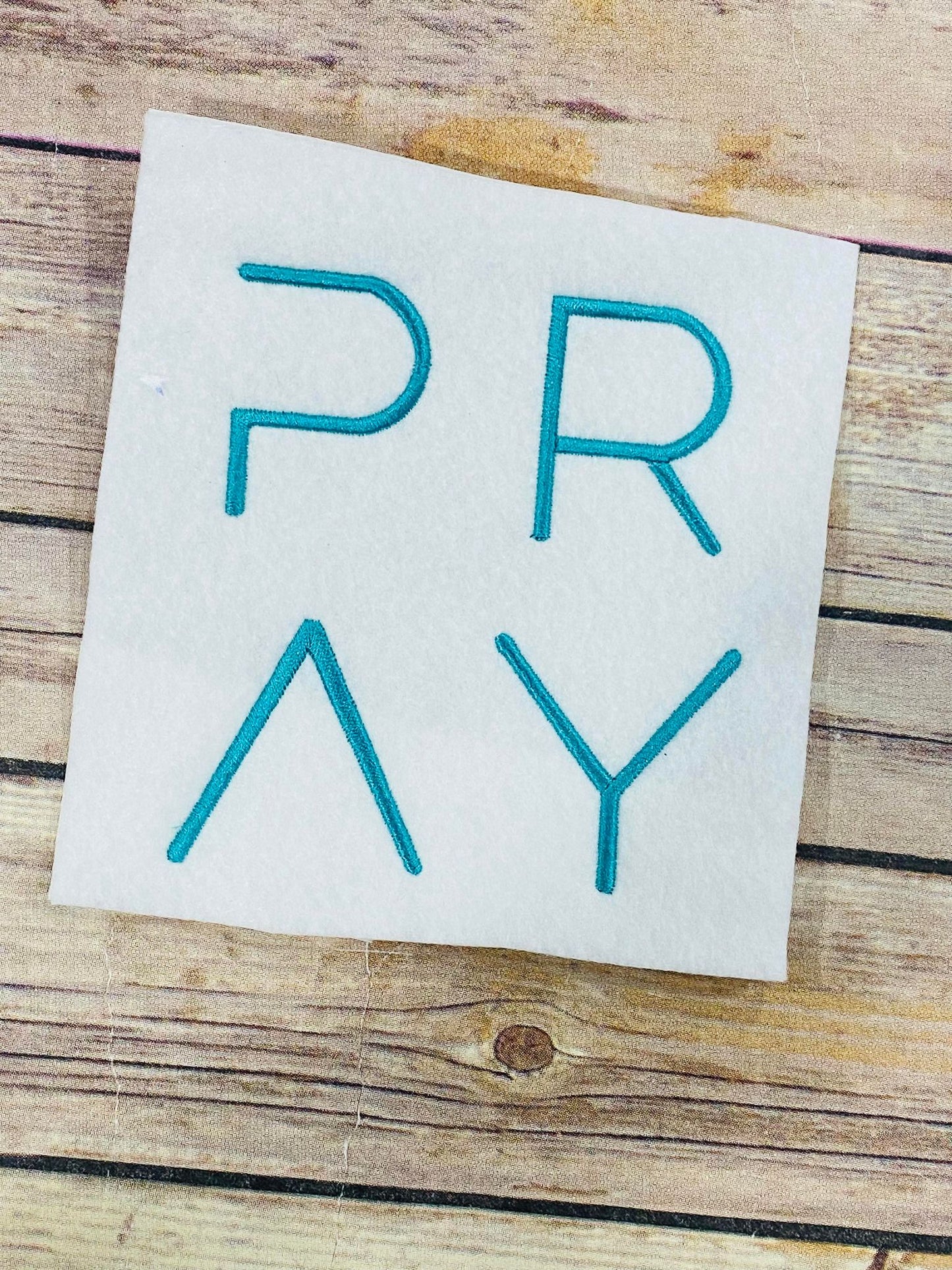 PRAY embroidery design