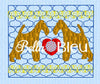 Faux smocking of Airedale dogs with a heart machine embroidery design